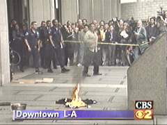 OJ Simpson memorabilia and jerseys being burned
